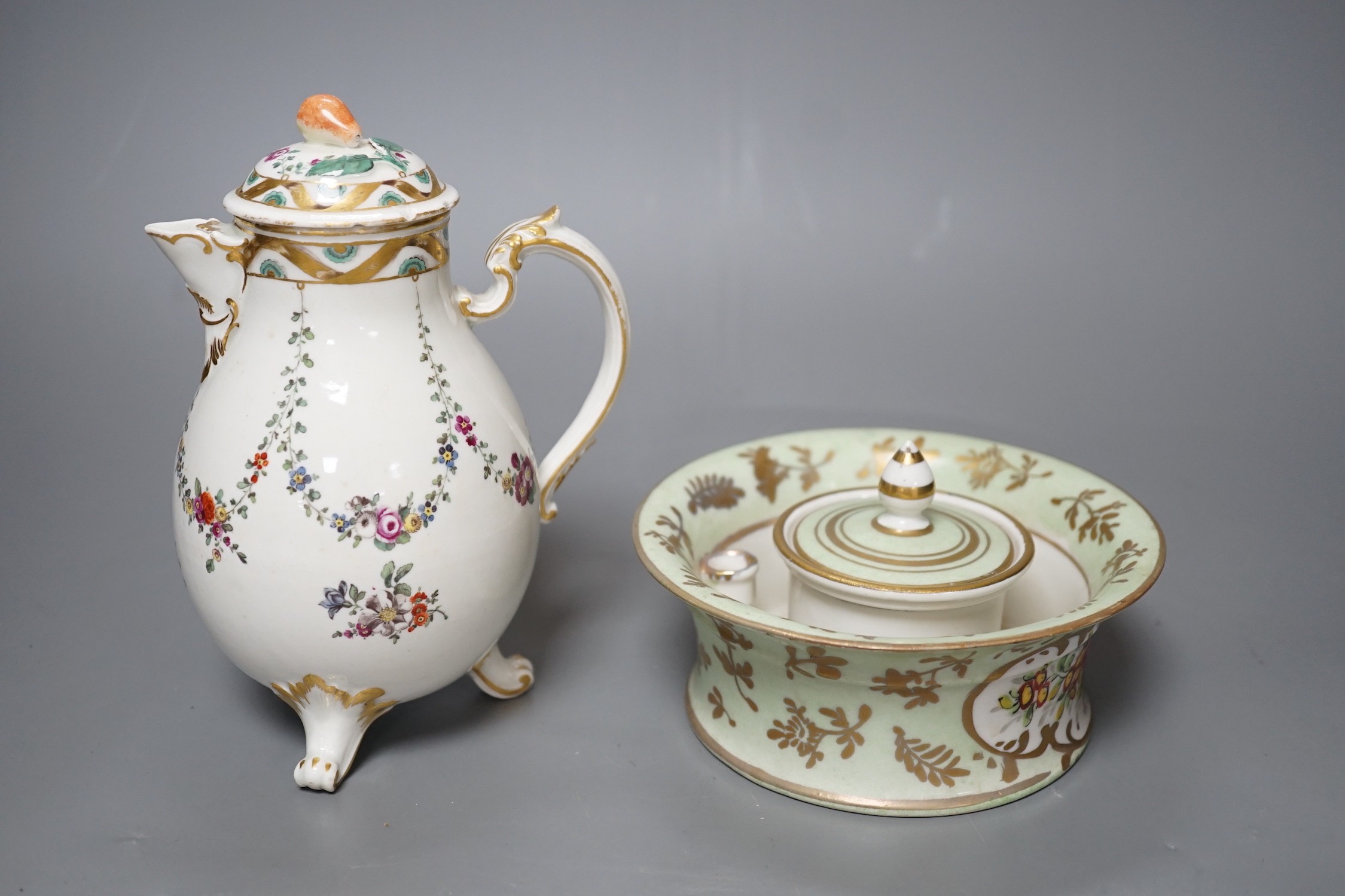 A Ludwigsburg three footed jug and cover painted with swags of flower c. 1770 and a 19th century French porcelain inkwell and cover a colourful gilt floral panel, jug and cover 17 cms high